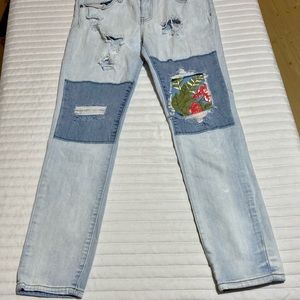 VIP Patch Distressed Skinny Jeans